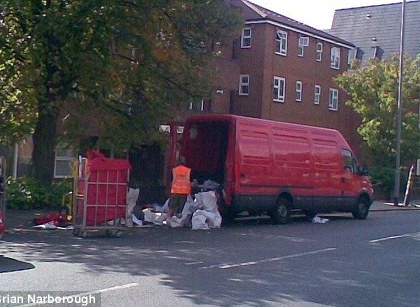 Royal Mail Managers sort mail on the street